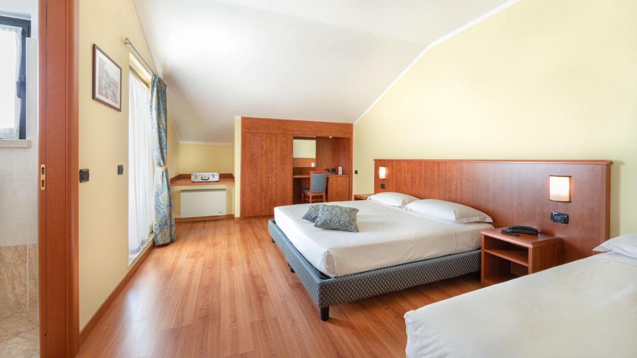 Hotel Postumia Dossobuono Bagian luar foto
