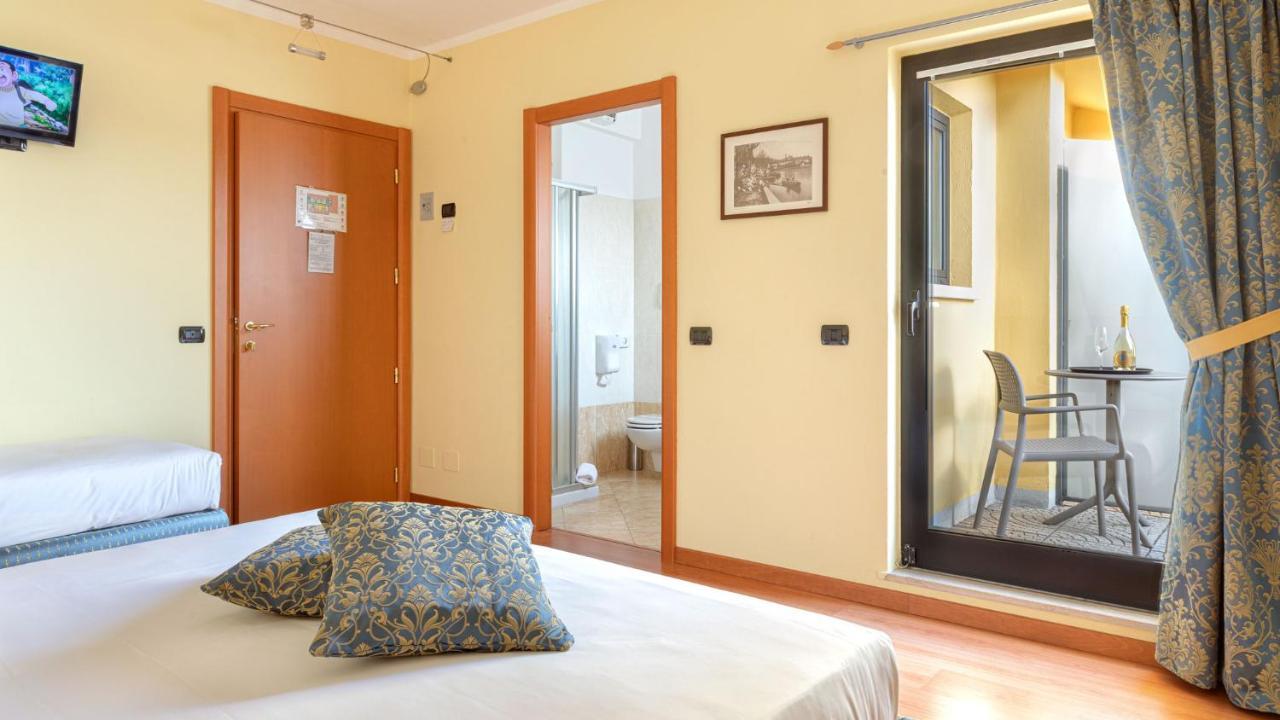 Hotel Postumia Dossobuono Bagian luar foto