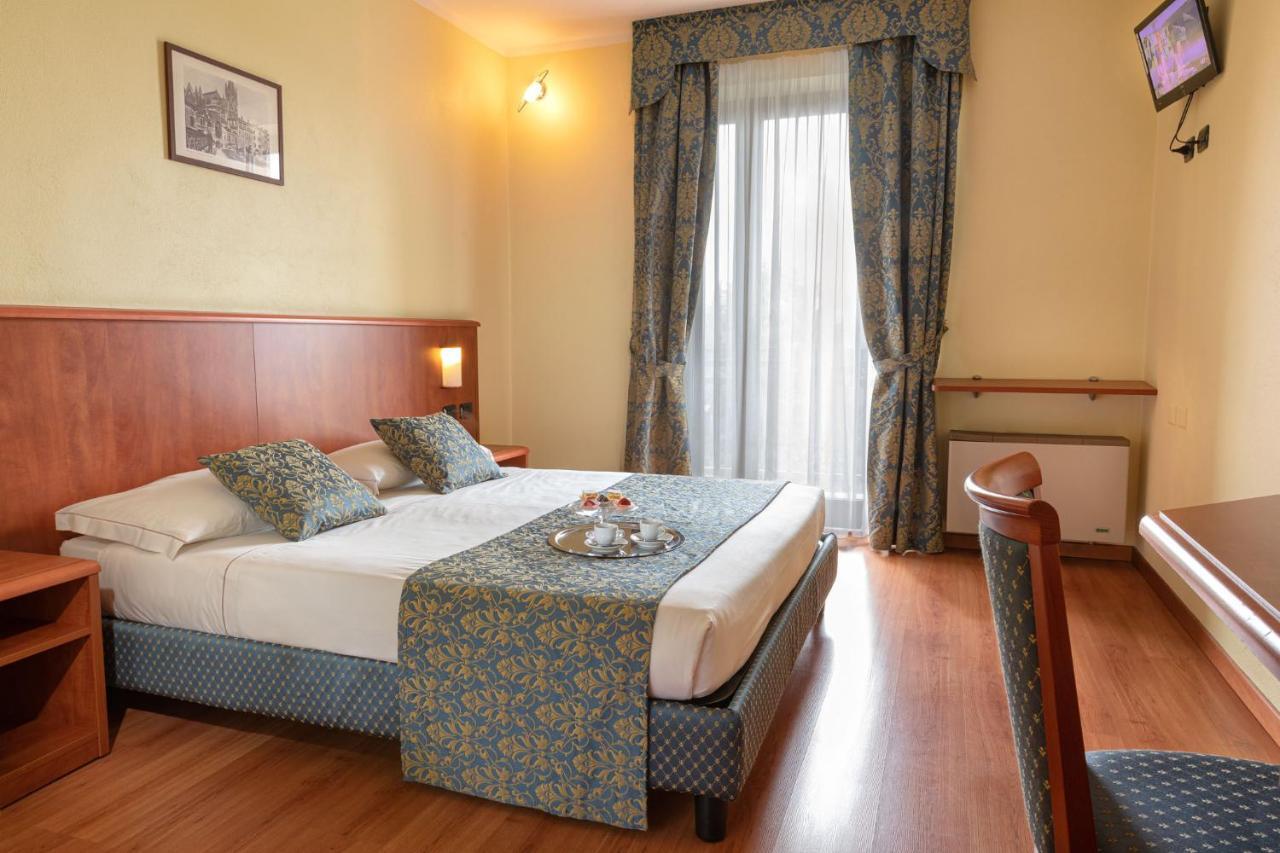 Hotel Postumia Dossobuono Bagian luar foto